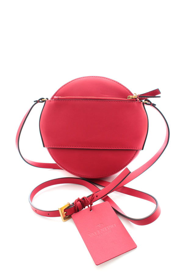 Valentino Garavani Vlogo Round Crossbody Bag in Pastel Pink Leather  ref.679392 - Joli Closet