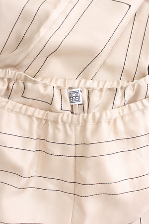 Toteme Monogram Embroidered Silk Trousers